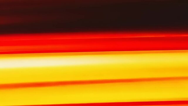 Abstract gradient of vibrant orange and yellow hues creating a warm, dynamic background effect