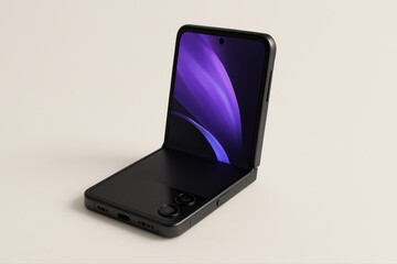 A matte black flip smartphone is shown partially unfolded on a neutral beige background