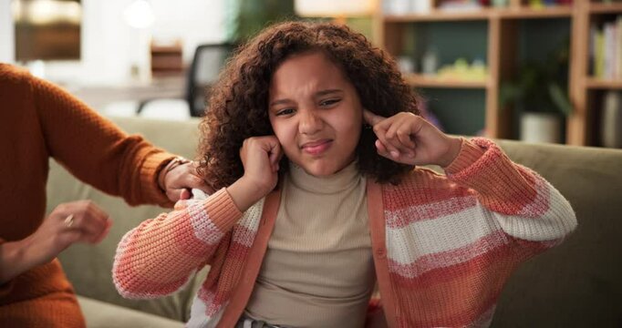 Family, conflict and mother with stubborn child on sofa for bd attitude, stress or fighting at home. Fingers in ears, ignore and angry girl in living room with hate, blame or frustrated by divorce