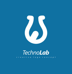 Fototapeta premium Techno lab simple logo design concept with chemistry flask and wrench tool in negative space. Vector logo idea.