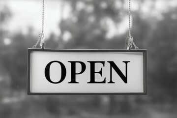 Minimalist OPEN Sign Hanging with Chains on Blurred Outdoor Background.