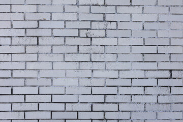 Cracked Paint Texture on a Tombstone with exposed concrete and brick at an Above Ground Graveyard - New Orleans Cemetery. Rough, gray, ornamental, background