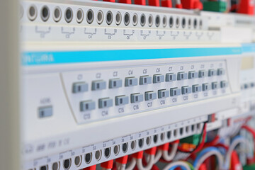 Relay module for controlling data bus loads in an electrical switchboard. 