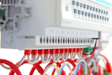 Relay module for controlling data bus loads in an electrical switchboard. 