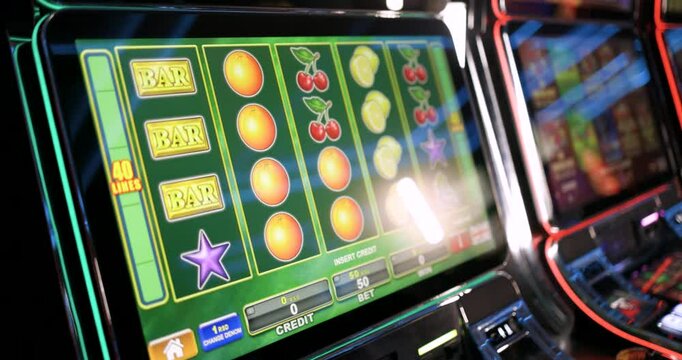 Casino Slot Machine Game With Colorful Fruit Symbols on Display