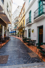 Narrow street scene in Estepona, Spain. Charming even on a rainy February day.