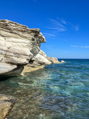 Naklejka premium Rocks in the sea. Mediterranean coast. A place to walk with a sea view. Cyprus