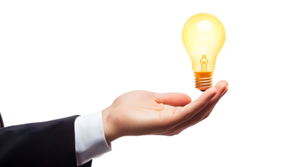 A hand holding a light bulb. The light bulb is lit up, and the person is holding it up to show it. The concept of innovation and creativity, as the light bulb, is often associated with new ideas