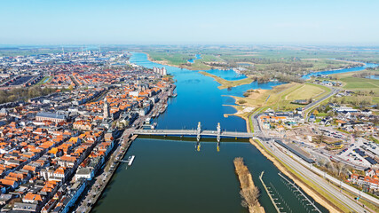 Fototapeta premium Aerial panorama from the historical city Kampen at the river IJssel in the Netherlands