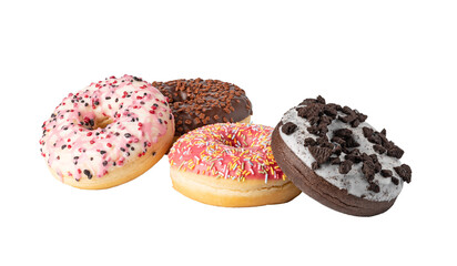Four iced ring donuts with sprinkles and cookie crumbs on transparent background
