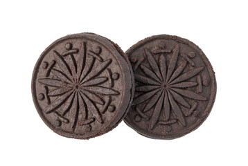 Two chocolate sandwich cookies with cream filling on transparent background