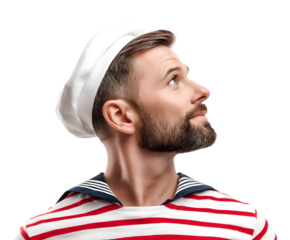 Man in a sailor's cap and striped shirt gazing upward with an attentive expression against a dark background, evoking themes of anticipation.