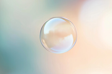 translucent bubble suspended in the air against a soft, pastel background. 