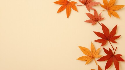 Obraz premium Autumn leaves on cream background for seasonal decor