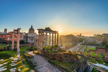 Roman forum ruins at sunrise in Rome. Italy