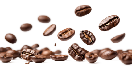 A large number of coffee beans scattered across a white background. The beans are in various stages of falling, with some still in the air and others already on the ground