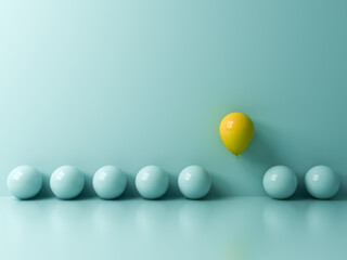 Stand out from the crowd and different concepts One yellow balloon flying or floating amongs other blue balls on light blue green pastel color wall background with reflections and shadows 3D rendering