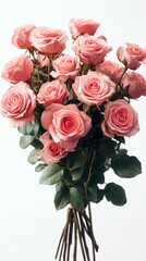 Beautiful bouquet of fresh pink roses with green leaves for special occasions or decoration in a modern setting
