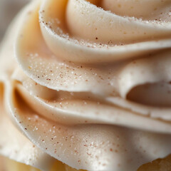 A macro shot of the delicate icing on a cupcake or layers of a pastry