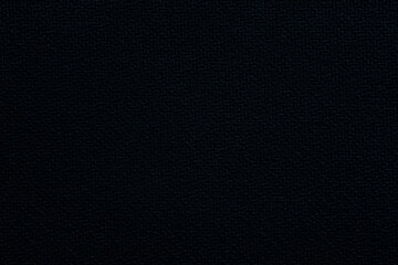 Close up macro texture.Dark background of fabric black mouse pad