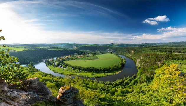 a breathtaking panoramic view from cesky sternberk castle in czech republic overlooking the lush countryside rolling hills and a winding river capturing the scenic beauty of this historic fortress