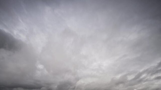 Timelapse of advancing storm clouds in a dark sky