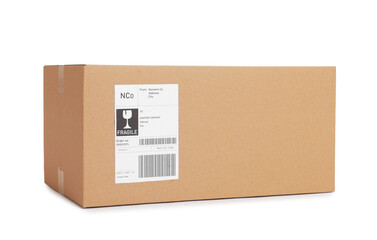 One parcel with shipment label isolated on white
