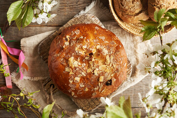 Mazanec, Czech sweet Easter pastry, with spring flowers, top view