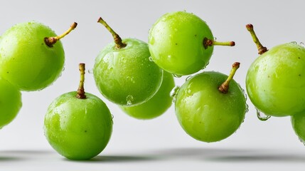 Bunch of green grapes are shown in the air, with their stems visible. Concept of freshness and vitality, as the grapes are depicted as being in motion and seemingly floating