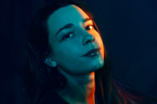 Portrait with Dramatic Lighting and Vibrant Color Effects
