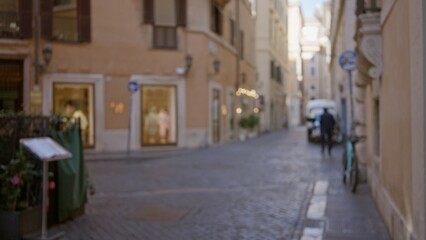 Naklejka premium Defocused street scene in rome with blurred people, showcasing old town charm, cobblestone path, european architecture, and a bokeh effect creating a dreamy ambiance.