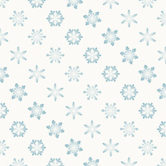 Seamless white winter pattern with blue gradient snowflakes, modern Christmas background ideal for wrapping paper, fabric, gift packaging, greeting cards and seasonal designs.
