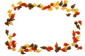 Frame made of tricolor pasta on white background
