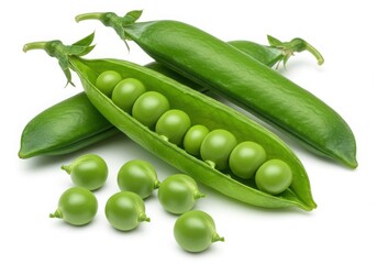 A close up shot of fresh green peas in pods and loose on a white background surface studio shot