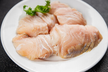 Rish fillet white fish raw seafood appetizer dish organic product fresh tasty gourmet food background on the table rustic food top view copy space 