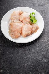 Rish fillet white fish raw seafood appetizer dish organic product fresh tasty gourmet food background on the table rustic food top view copy space 