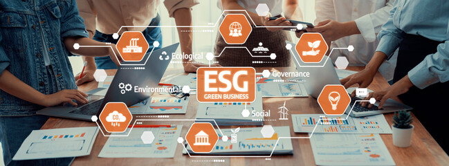 Analyst team utilizing BI Fintech to analyze and pointing at financial dashboard paper office. Businesspeople examining report paper on table for business insight. Panorama shot. Scrutinize Amity