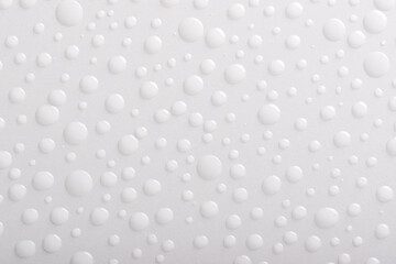 Close up water drops on white background. Top view.