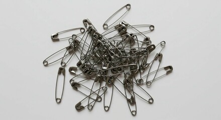 Fototapeta premium paper clips on black