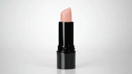 Obraz premium Minimalist nude lipstick in black tube on white background