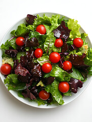 Healthy fresh salad made of green lettuce, red cherry tomatoes and radicchio, ideal for a nutritious meal.