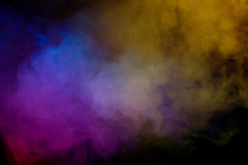 Yellow and green steam on a black background.