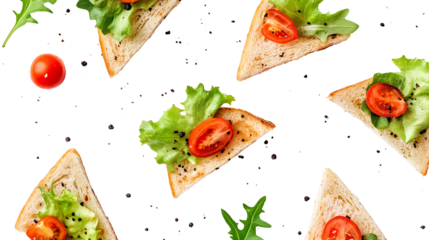 Mini sandwich triangles with lettuce and tomato, top view, white background PNG
