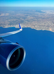 Beautiful view from the plane on the ocean coast	