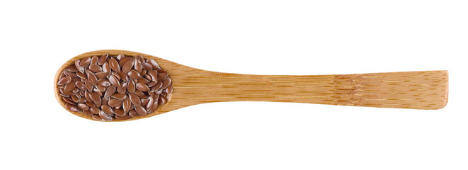 Flax seeds in a wooden spoon isolated on white background