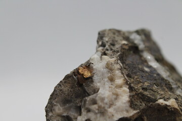 Pyrrhotite mineral isolated on a white background. Pyrite mineral isolated on a white background....