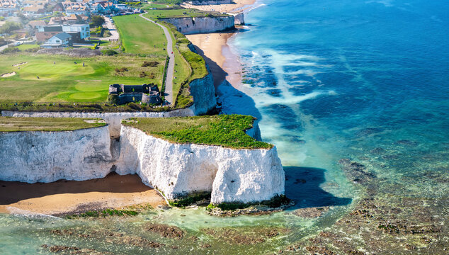 Aerial view of the beautiful Botany Bay Beach at the coast of England, Kent, with white limestone cliffs in the ocean