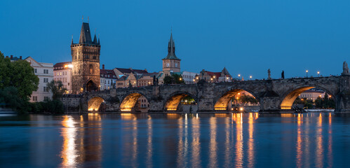 Fototapeta premium Charles bridge in Prague, Czech Republic, in the evening