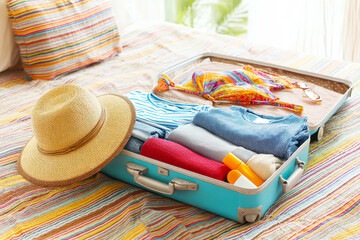 Travel essentials organized in a suitcase showcase the joy of vacation planning