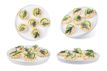 Salmon mousse tartlets in a plate on a white isolated background
